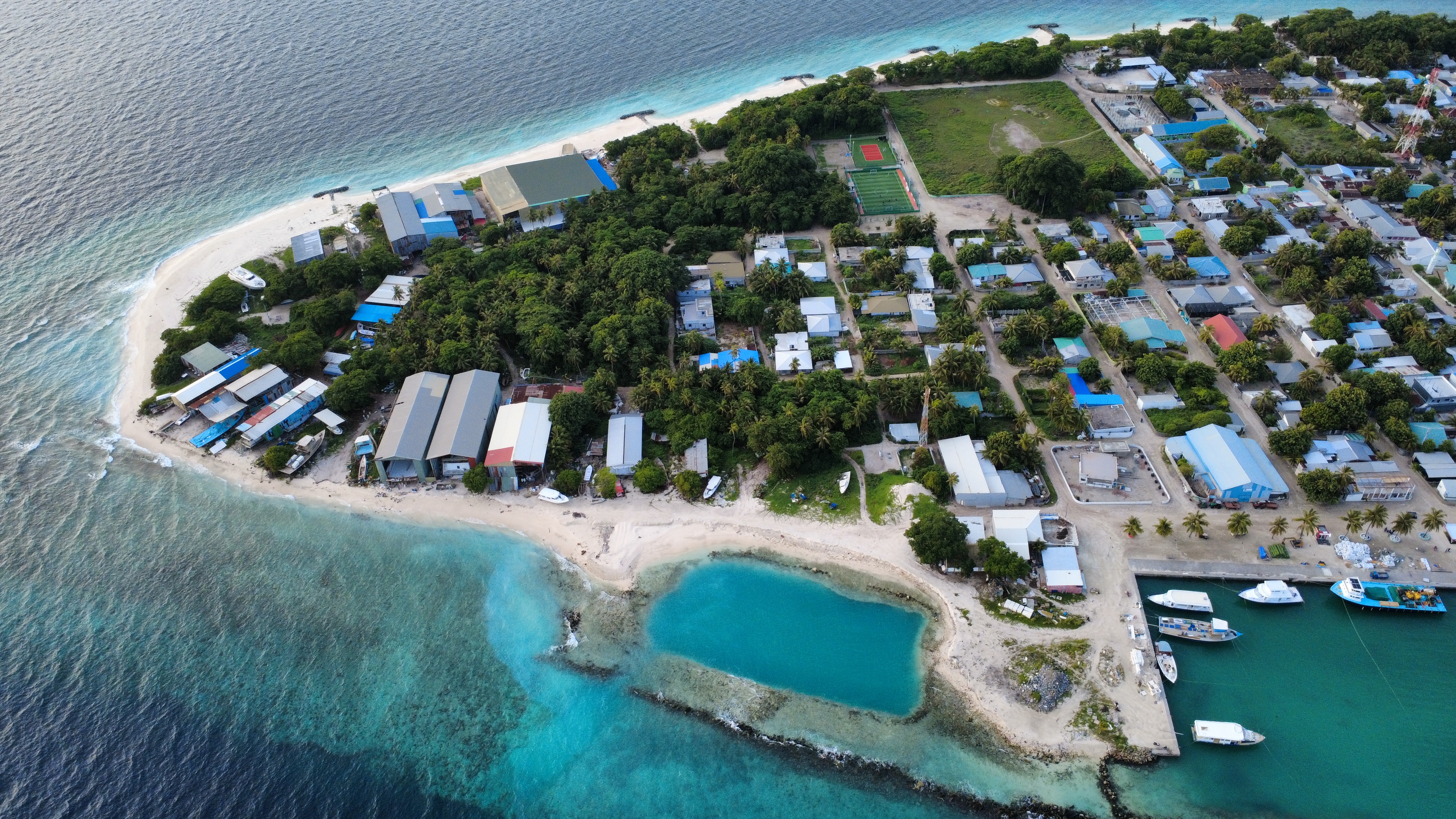 Drone photo of Innamaadhoo island and turquoise waters
