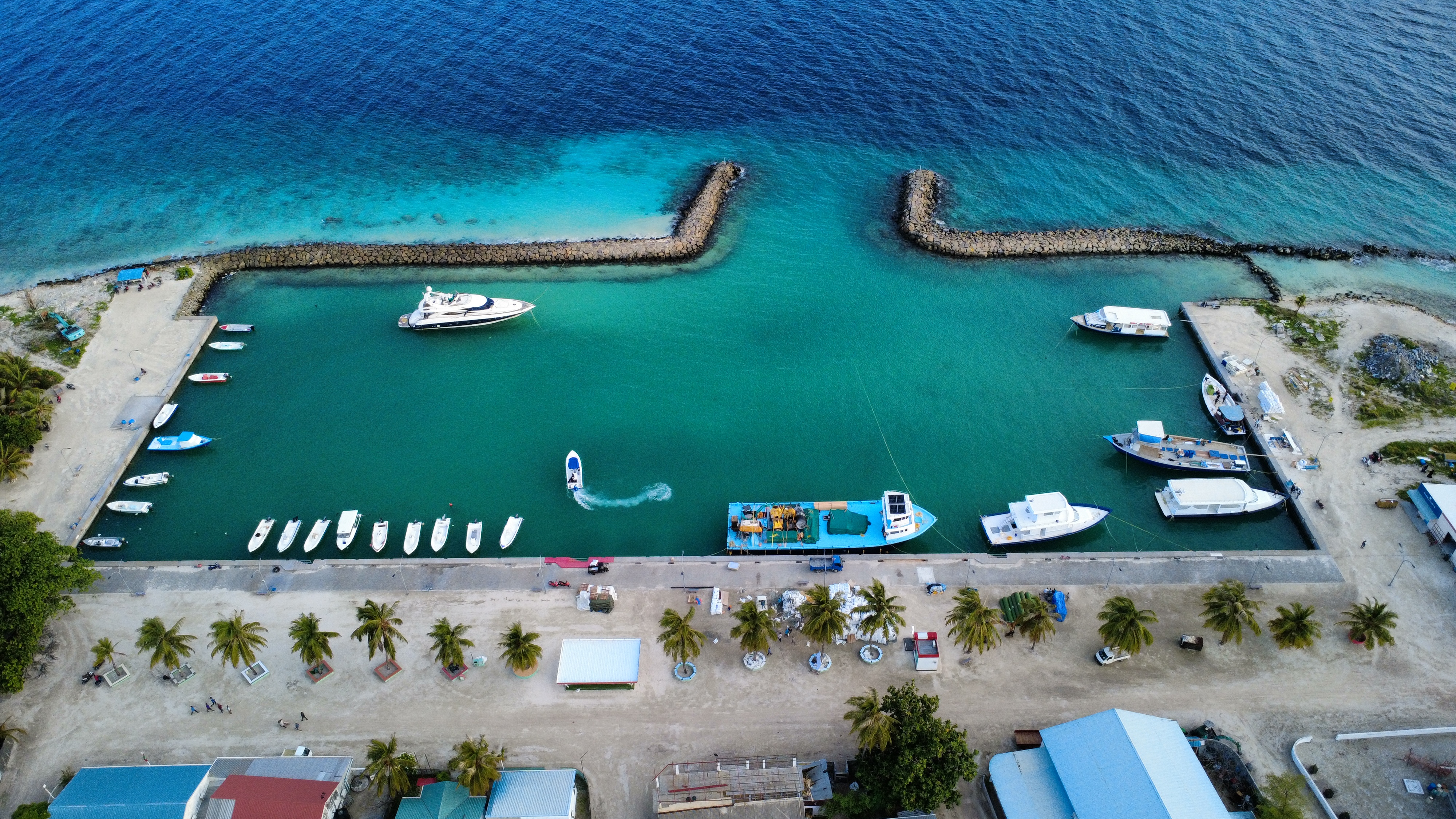 Aerial view of Innamaadhoo island surrounded by the Indian Ocean